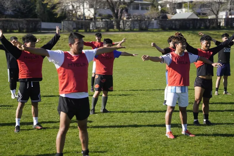 Arms out, all together, Himalaya Tasman FC training