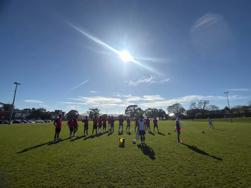 Team talk in the sun, Himalaya Tasman FC training